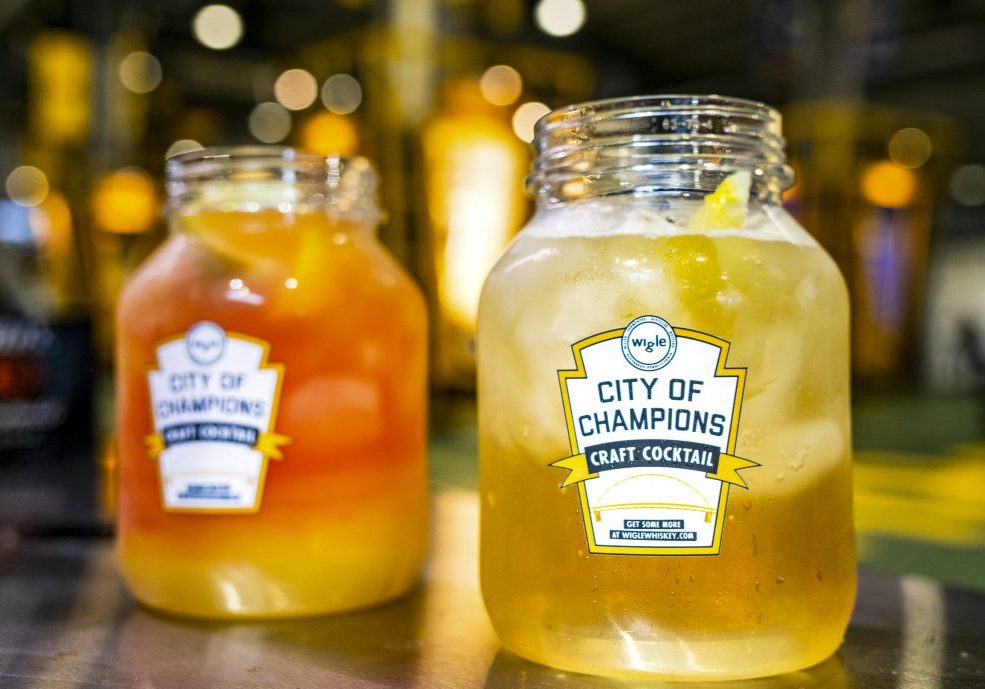 Two freshly made cocktails in mason jars from Wigle Whiskey at Acrisure Stadium.